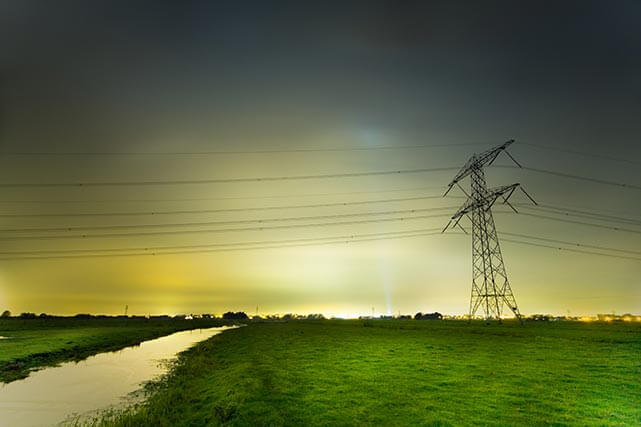 a field with a powerline