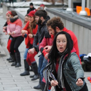 Campaigners do a little dance, to the crowd's delight.