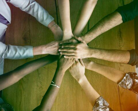 Human hands holding together