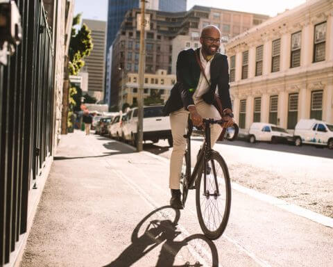Sustainable city leadership - man on bike