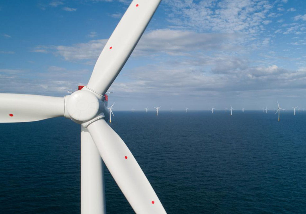 A close-up of an offshore wind turbine